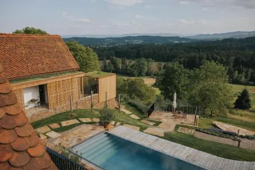Am Wildbachberg - Luxus Ferienhäuser mit Infinitypool, Privatsauna und Weinkeller in Deutschlandsberg, Österreich