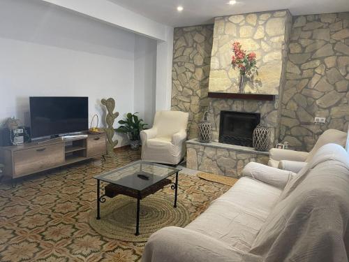 gedeelde lounge/tv-ruimte, Casa Rural la Ermita in Fregenal De La Sierra