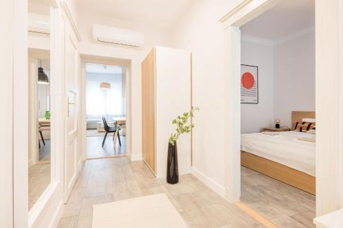 Elegant Suite with Minimalist Design - Tap to explore photos