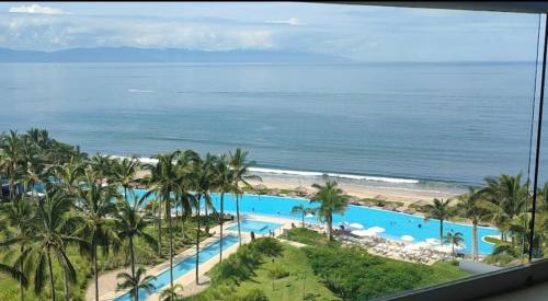 An Iconic beachfront apartment- Peninsula Resort in Nuevo Vallarta , Mexico