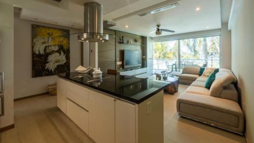 An Iconic beachfront apartment- Peninsula Resort in Nuevo Vallarta , Mexico