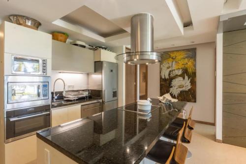 An Iconic beachfront apartment- Peninsula Resort in Nuevo Vallarta , Mexico