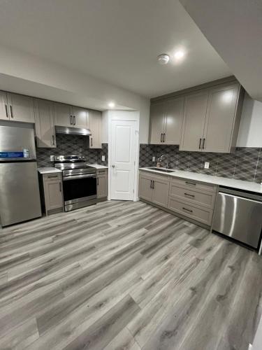 Cozy Two Bedroom Guest Basement Suite in NW - Tap to explore photos