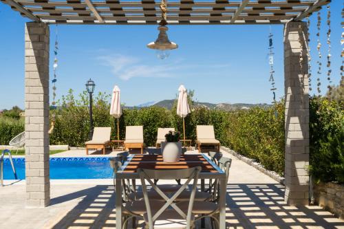 Villa G&K, An Enchanting Secluded Retreat by MindYourVilla in Kalpaki