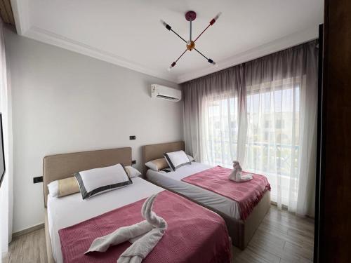 Twin house 4 master Bedrooms premium mountain view Ras Elhikma in Zawiyat Ailat Nuh