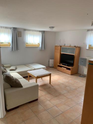 Közös társalgó / TV, Pension Ella in Sulzfeld am Main