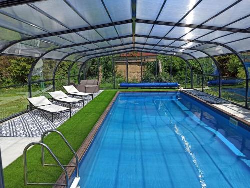 La Petellerie, maison de campagne avec piscine pour un séjour détente gîte à louer Le Mesnil-Herman