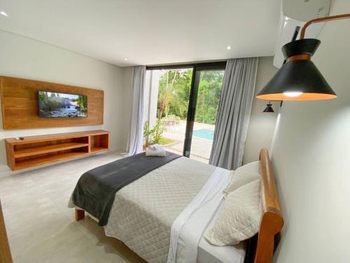 Líquens Ilhabela - Flat 4 a 50m da Praia Veloso (Liquens Ilhabela - Flat 4 a 50m da Praia Veloso) in หาดเวโลโซ