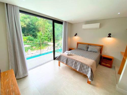 Líquens Ilhabela - Flat 7 a 50m da Praia Veloso (Liquens Ilhabela - Flat 7 a 50m da Praia Veloso) in Praia do Veloso