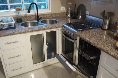 Kitchen, CasaMia RD B&B in Rio San Juan