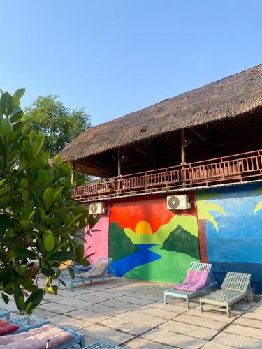 Exterior view, Sunrise Riverside Pool Hostel in Luang Prabang