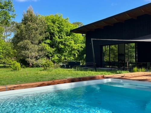 Skats, La Maison dans l'Airial, maison d'architecte en pleine nature, PISCINE in Onesse-Laharie