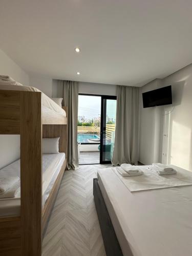 Quadruple Room with Pool View room in Noa Boutique Hotel