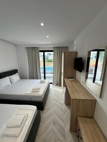 Deluxe Triple Room with Pool View room in Noa Boutique Hotel