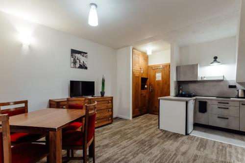 gedeelde lounge/tv-ruimte, Hotel Mikulasska Chata in Demanovska Dolina