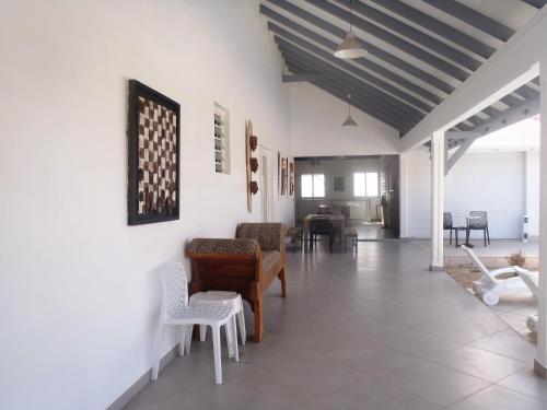 Balcony/terrace, Grande villa avec piscine et jacuzzi, vue mer splendide, proche des plages de Grand Anse et de l'Ans in Terre-de-Haut