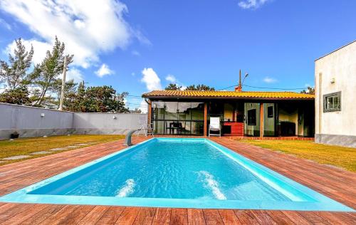 Casa a poucos metros da Praia do Coral - Cabo Frio – khách sạn tại Unamar