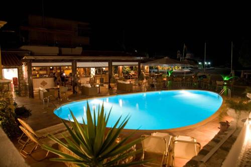 Oasis Beach Hotel Oasis Beach Hotel is a popular choice amongst travelers in Skala, whether exploring or just passing through. Offering a variety of facilities and services, the hotel provides all you need for a good n