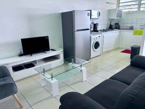 gedeelde lounge/tv-ruimte, Bleu Soleil in Le Carbet