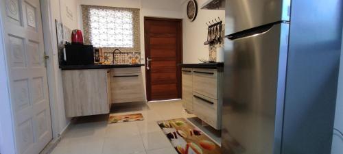 Studio Orchidée - Vue sur jardin et terrasse privée (Studio Orchidee - Vue sur jardin et terrasse privee) in Remire-Montjoly