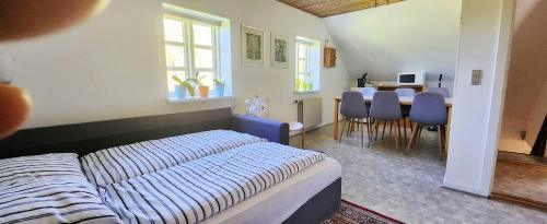 Quiet and cozy apartment close to nature in villa. in Tilst