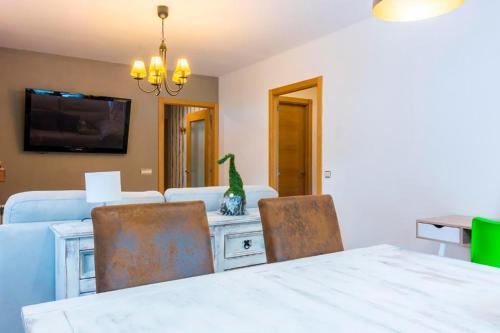 Apartamento a 15 minutos de Baqueira con parking y terraza in Es Bòrdes