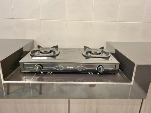 Kitchen, Zizi Homey Cemara Asri (Private House max 14ppl) in Medan Timur