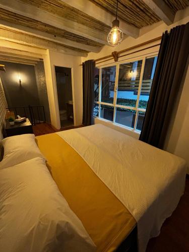 Casa Columpio Room Type - Deluxe King Suite