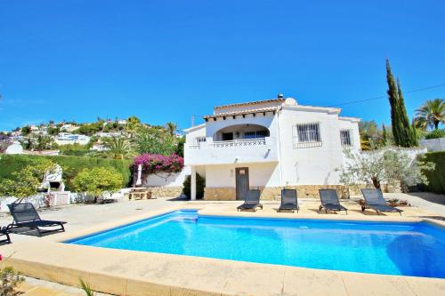 Yojo - holiday villa with private pool and panoramic views in Moraira, Moraira (fotografie 3)