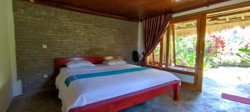 Hakiki Inn Bungalows – Tetebatu, ID