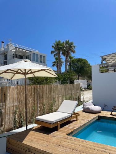 Minimal Grey Apartment Pool-front in Paros