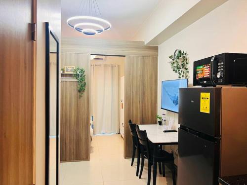1BR Condotel with Balcony at FAME Residences #FM26, Manila
