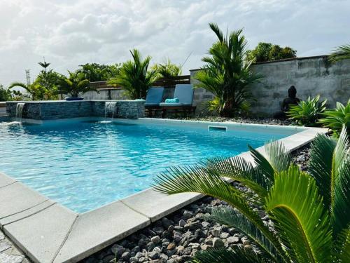 Jardín, Refuge PêBê Joli logement au coeur d'un immense jardin tropical (Refuge PeBe Joli logement au coeur d'un immense jardin tropical) in Ducos