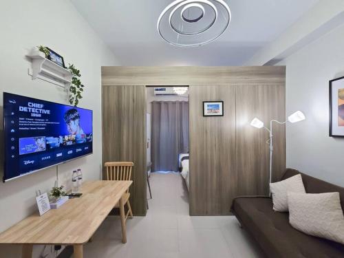1BR Condotel with Balcony at FAME Residences #FM30, Manila