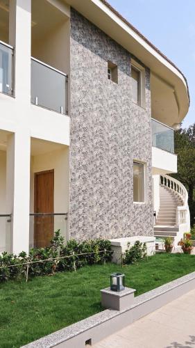 Buitenkant, Damodar River Retreat, Uluberia in Orphuli