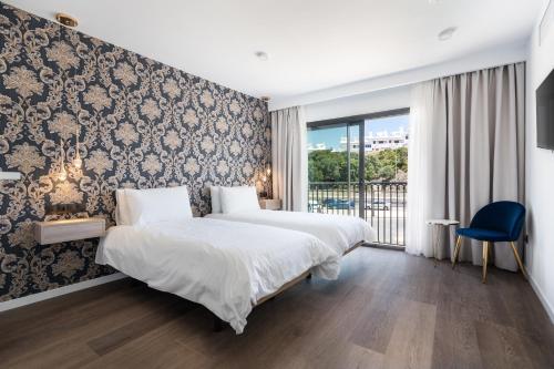 The Orange House Boutique Hotel and Upstairs Rooftop Bar Center of La Cala de Mijas 100m from the Be in Mijas