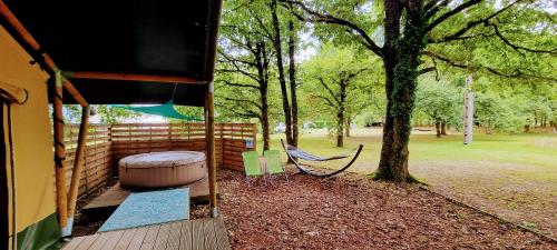 Luxury Safari Tent with Hot Tub at Camping La Fortinerie