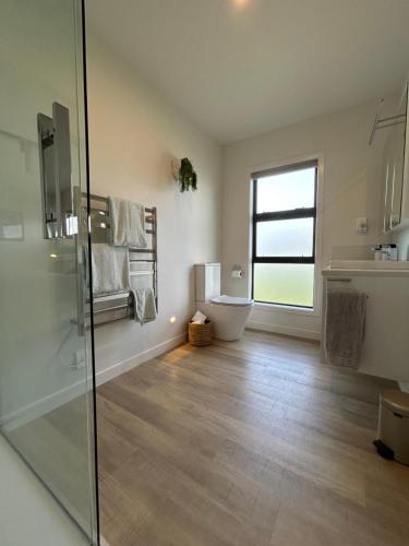 Baño, Purangi Waterfront Retreat in Whitianga