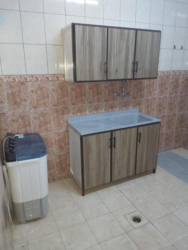 ห้องครัว, فندق دلة نمار للشقق الفندقيه in อัช ชีฟา