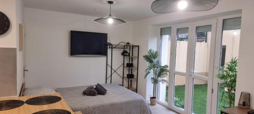 2-Appartement RDC avec jardin - Location saisonnière - Mantes-la-Jolie