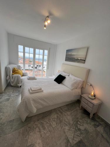 One-Bedroom Apartment with Balcony and Sea View