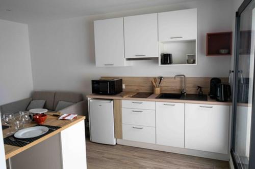 Iekārtas, appartements guesthouse1 et guesthouse2 sword beach in Colleville-Montgomery