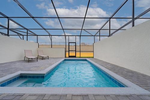 Stylish 5BR Retreat with Pool Near Disney - image 9