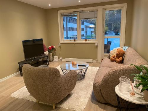 Leilighet 20 min fra sentrum! in 布耶爾克