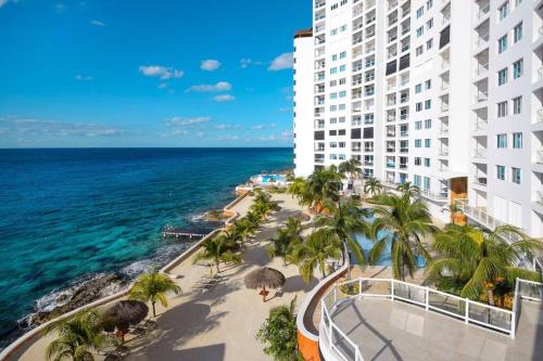Exclusive beachfront condo in Peninsula Grand in Cozumel, Mexico