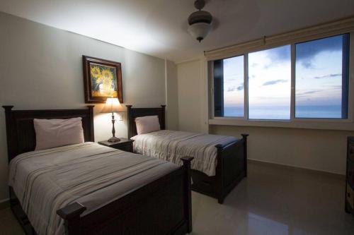Exclusive beachfront condo in Peninsula Grand in Cozumel, Mexico