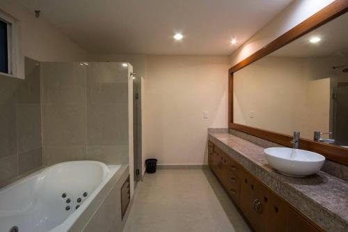 Exclusive beachfront condo in Peninsula Grand in Cozumel, Mexico