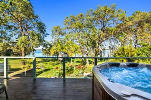 Blissful Lakefront Pool and Oasis in Lake Munmorah