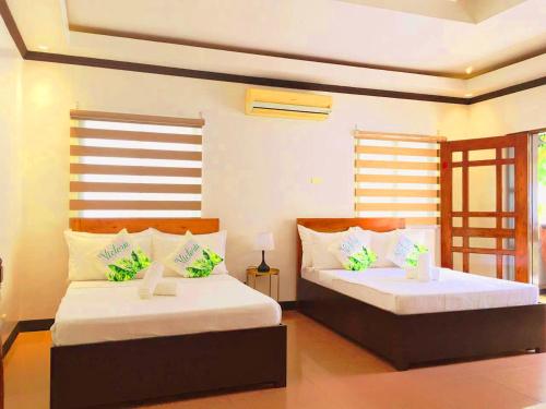 Victoria's Inn by Martha Vacation Homes in Barangay Manoc-Manoc