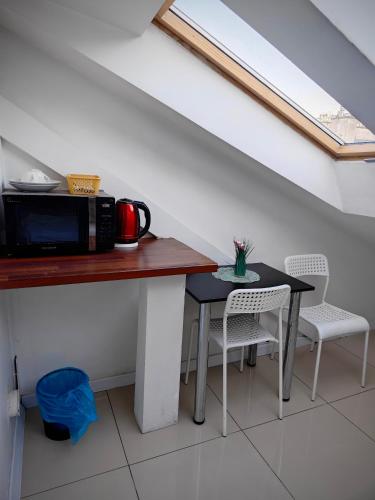 Apartamenty Hoza Attic Studio – Warsaw, NE